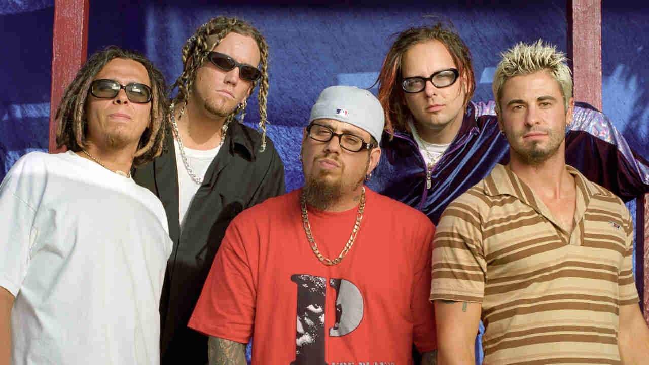 Korn posing for a photograph in the 1990s